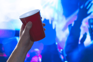 Minors consuming alcohol at a party. Minors consuming alcohol at a party.