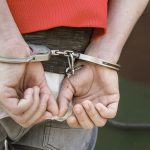 man in handcuffs man in handcuffs